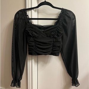 Black long sleeve crop top from Forever 21. Used but like new!